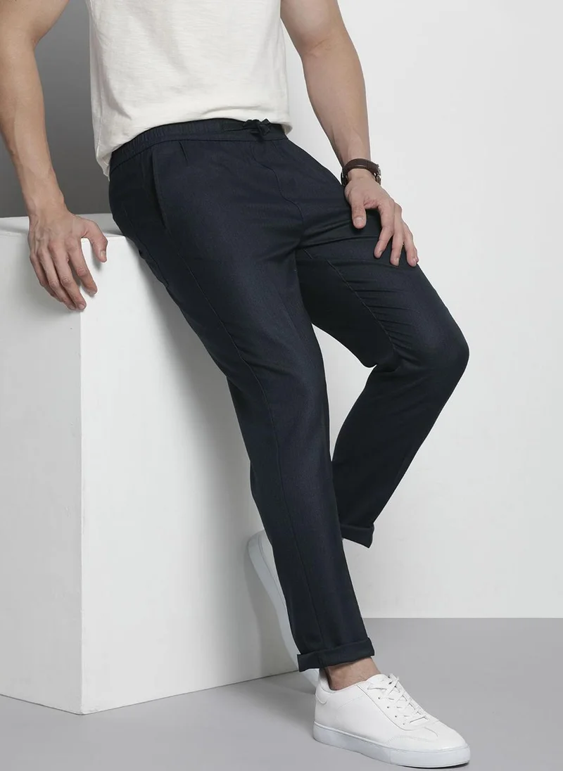 ذا انديان كراج كو Men Regular Fit Self Design Mid-Rise Stretchable Jogger Trousers