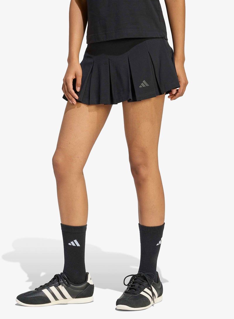 اديداس تنورة ملونة أساسية للموسم مع ليجن داخلي - Image 1