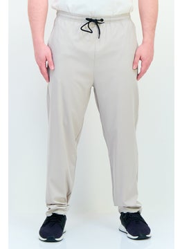 RBX Men Sportswear Fit Brand Logo Training Track Pants, Stone  - Image 1
