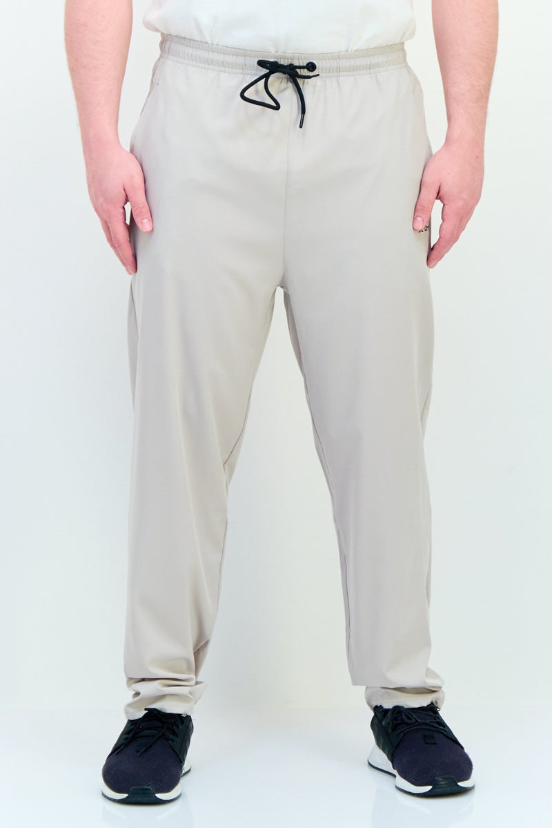 RBX Men Sportswear Fit Brand Logo Training Track Pants, Stone  - Image 1