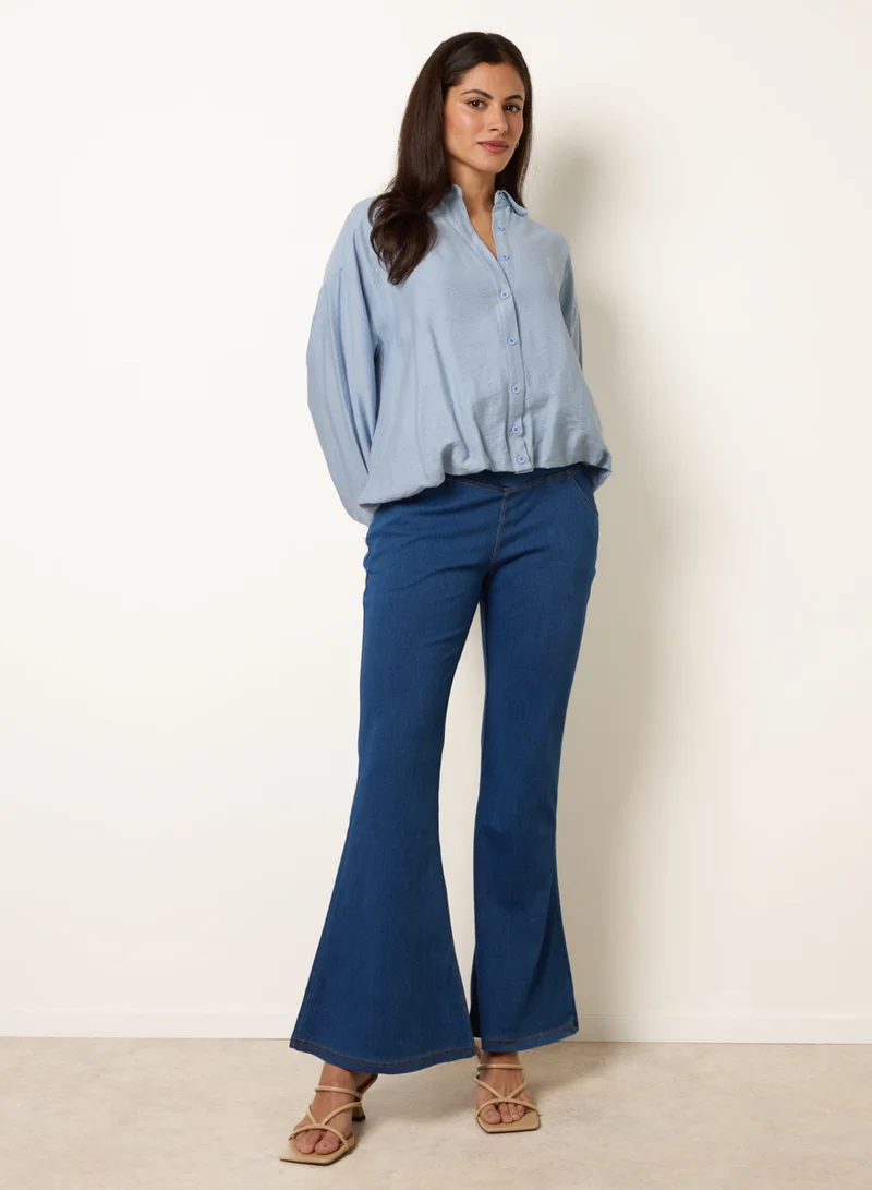 بلو فانيلا Flared Cross Over Waistband Jeans