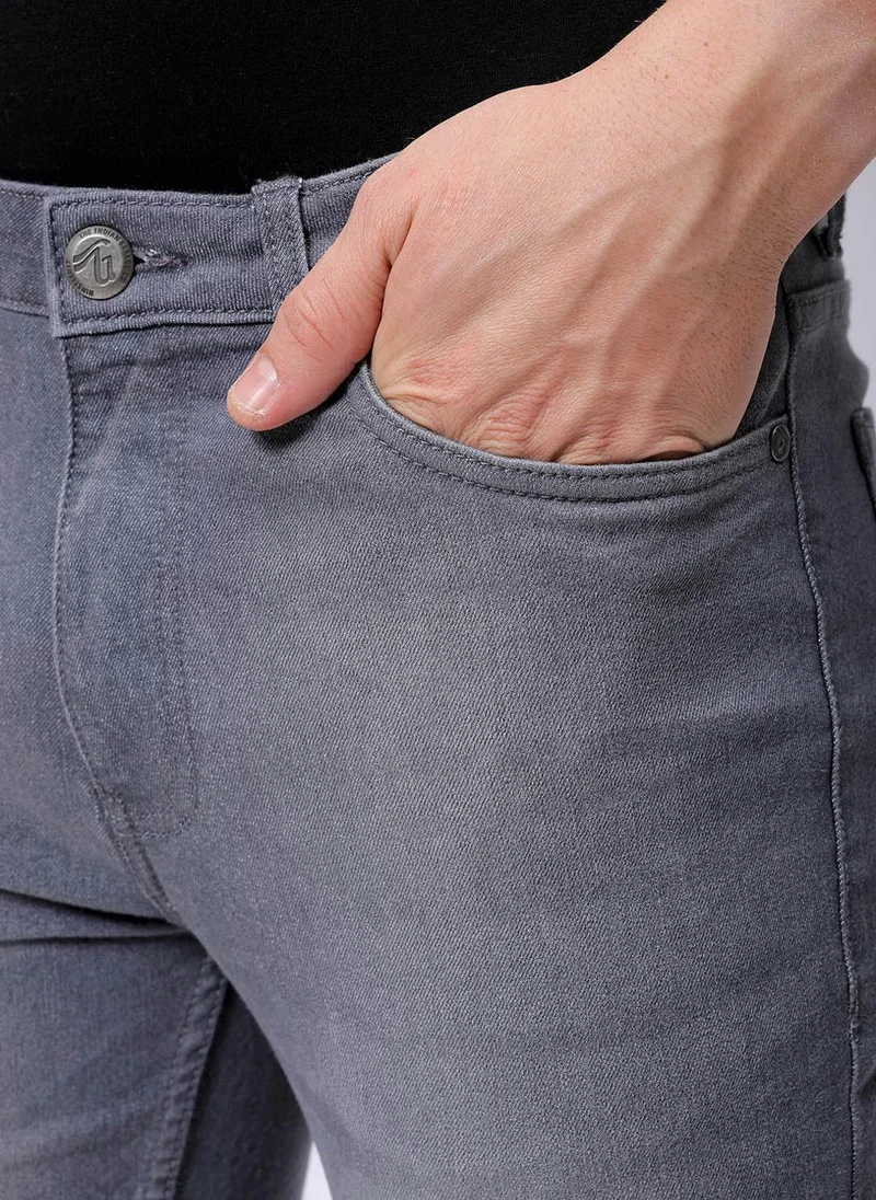 The Indian Garage Co  Men Slim Fit Solid Mid-Rise Stretchable Jeans for Men | Best Price UAE