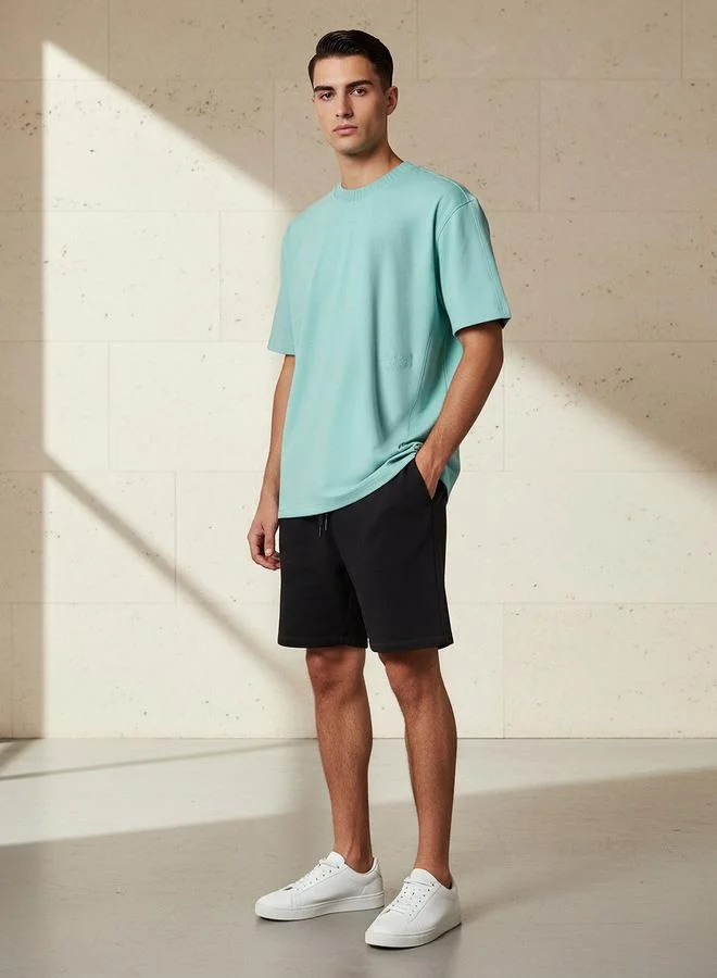 لي كوبر Lee Cooper Men Regular Fit Crew Neck Short Sleeve Embroidered T-shirt