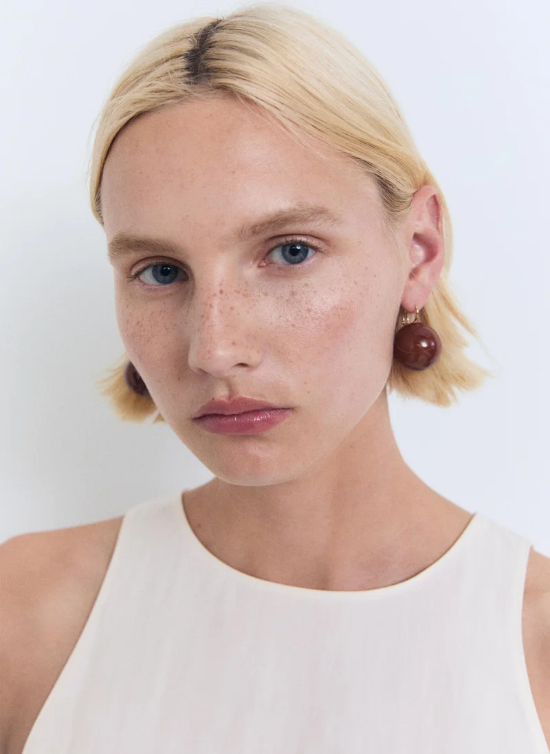 مانجو بلوزة بياقة هالتر ضيقة