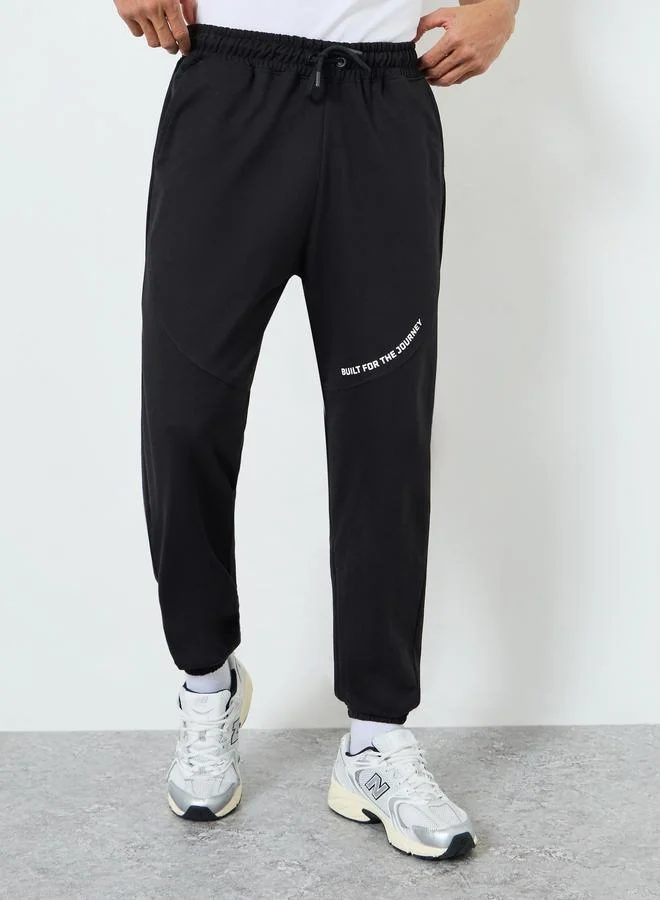 Men Black Slogan Joggers