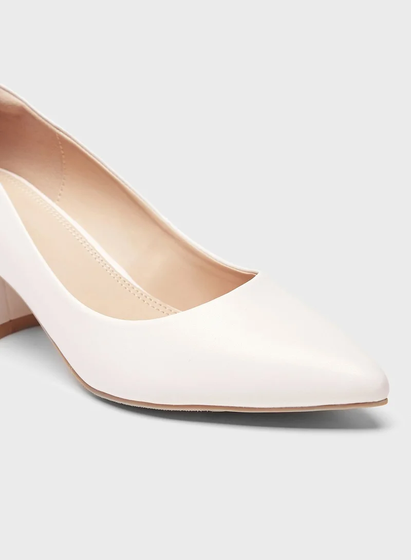 Celeste Close Toe Mid Heel Pumps