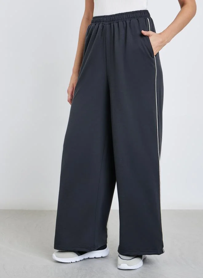 Styli Women Charcoal Wide Leg Joggers with Contrast Piping Detail