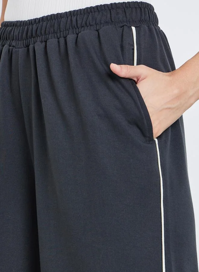 Styli Women Charcoal Wide Leg Joggers with Contrast Piping Detail