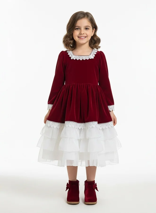 HAWRAA ABAYA Girls’ velvet dress in burgundy with tulle layers and lace – a luxurious design with a back bow belt