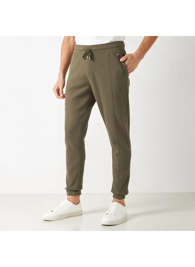 Iconic Iconic Solid Panelled Joggers with Elasticated Waistband and Pockets