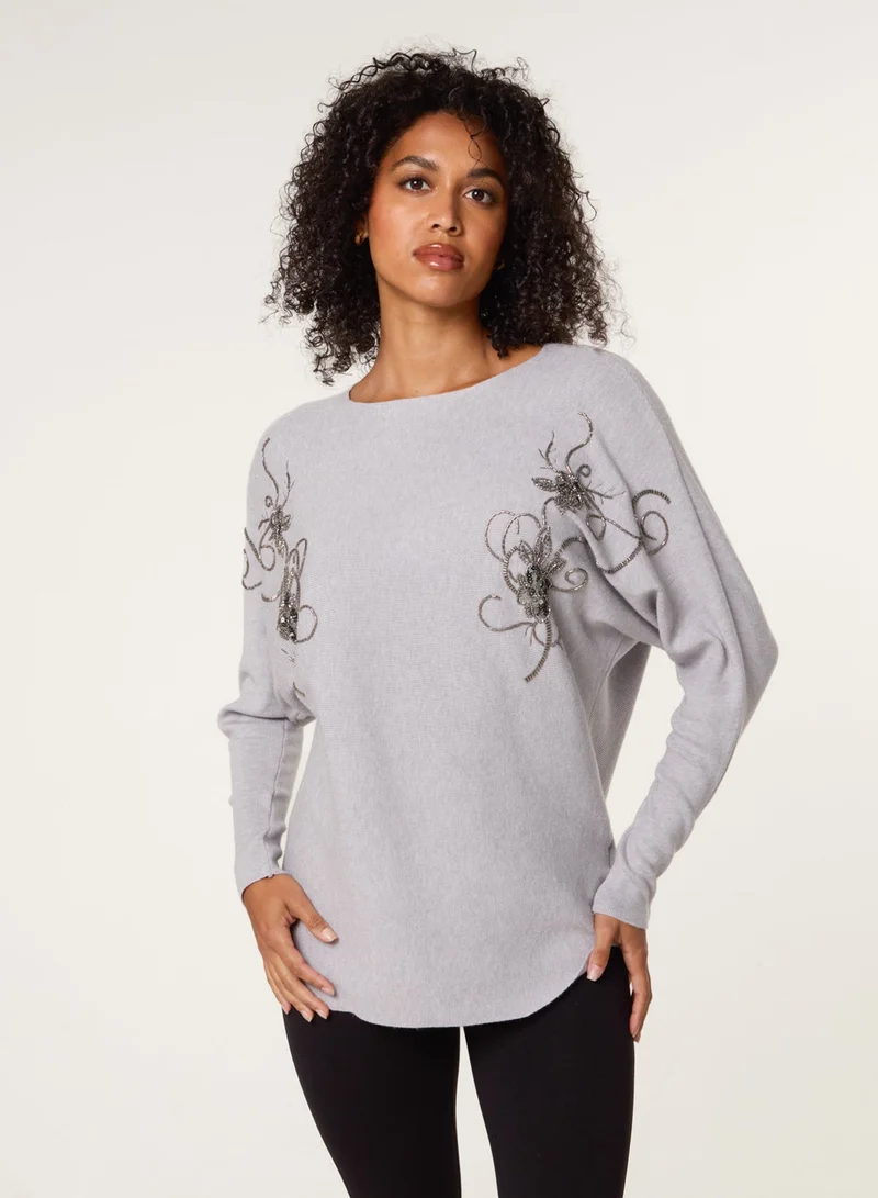 بلو فانيلا كنزة مطرزة بأكمام طويلة