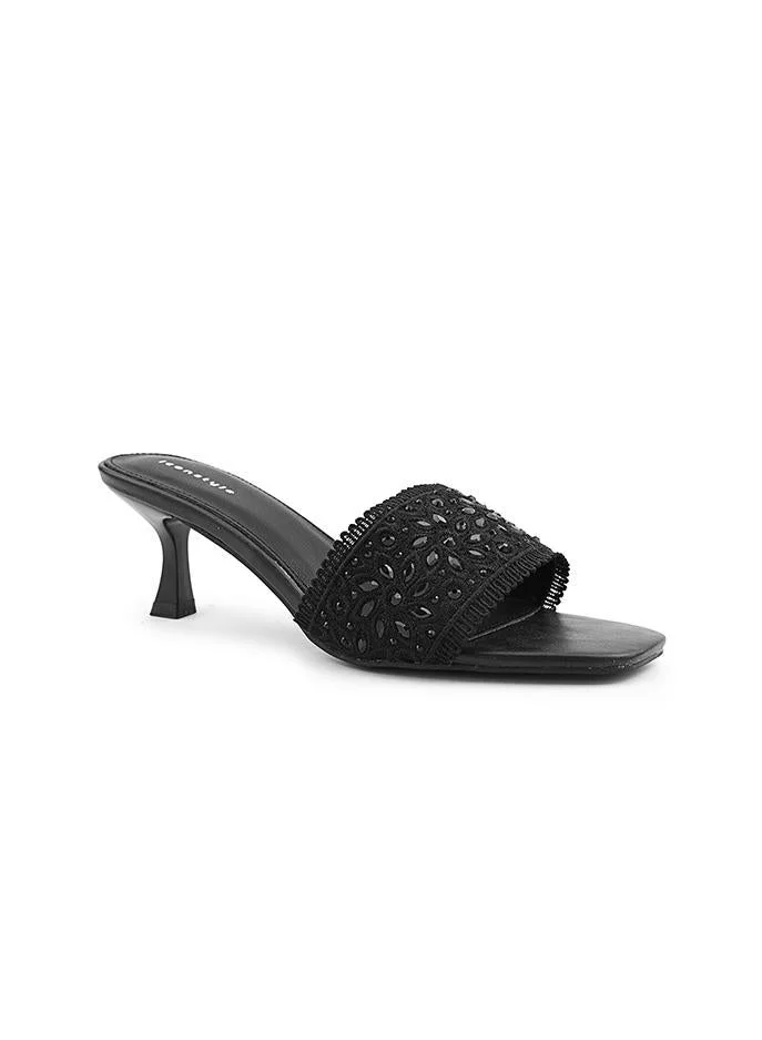 IconStyle Elegant heel slipper featuring delicate pearl details.