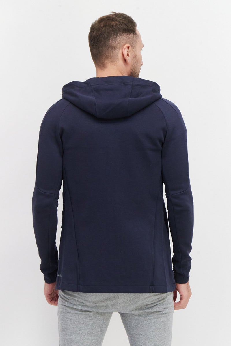 PUMA جاكيت تدريب رياضي للرجال بشعار العلامة التجارية، لون أزرق غامق مترب - Image 3