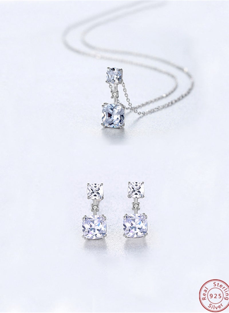 A silver jewelry set consisting of a square zircon pendant necklace and a pair of stud earrings is fashionable and luxurious for parties and banquets  - Image 1