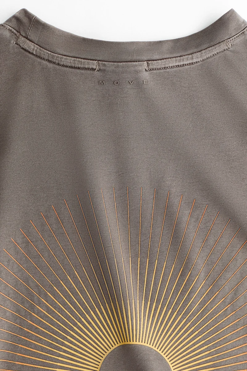 H&M  Loose Fit boxy-style sports T-shirt with DryMove™ for Men | Best Price UAE