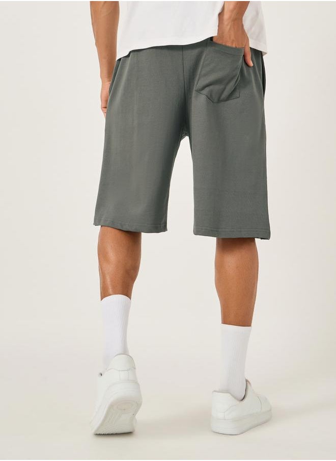 Styli Oversized Solid Shorts with Drawstring