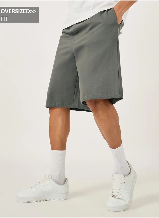 ستايلي Styli Oversized Solid Shorts with Drawstring