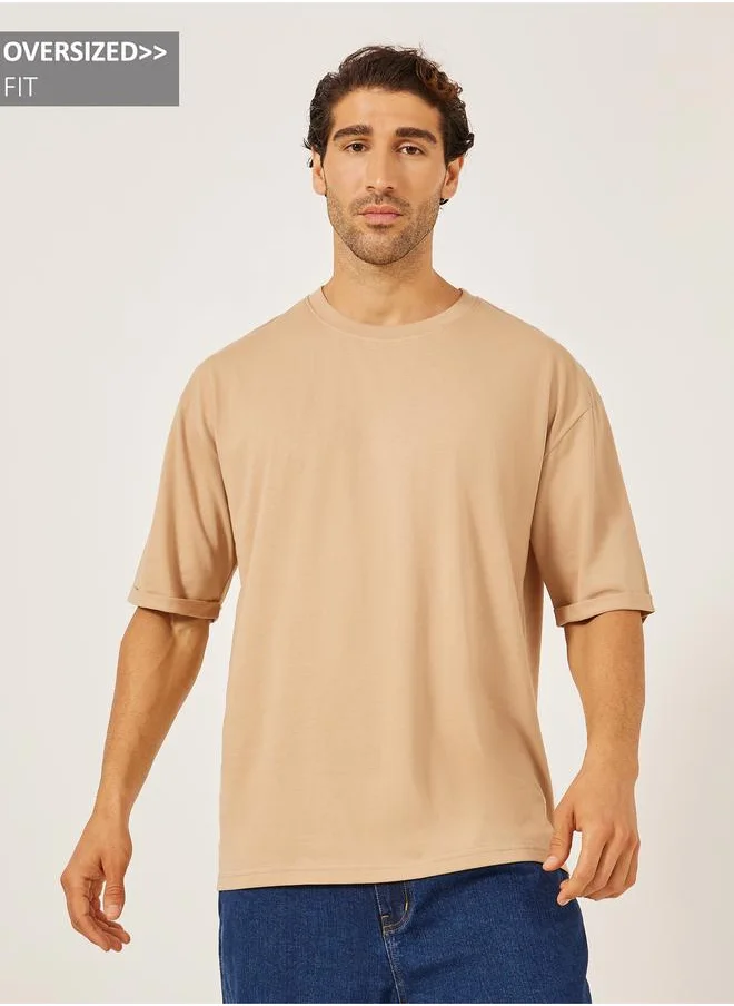 ستايلي Styli Oversized Roll Up Sleeves T-Shirt with Side Slit