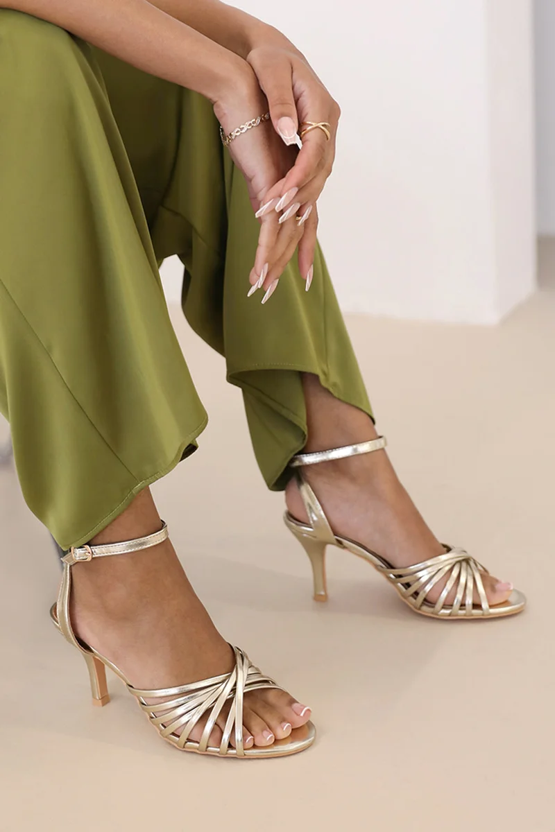 Where's That From Cyprus Multi Cross Over Strap Mid Heels In Gold Faux Leather
