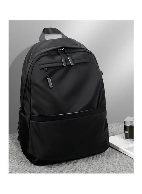 شنطة ظهر مقاومة للماء بتصميم عصري وخامة متينة بسعة كبيرة وجيوب متعددة - لون أسود