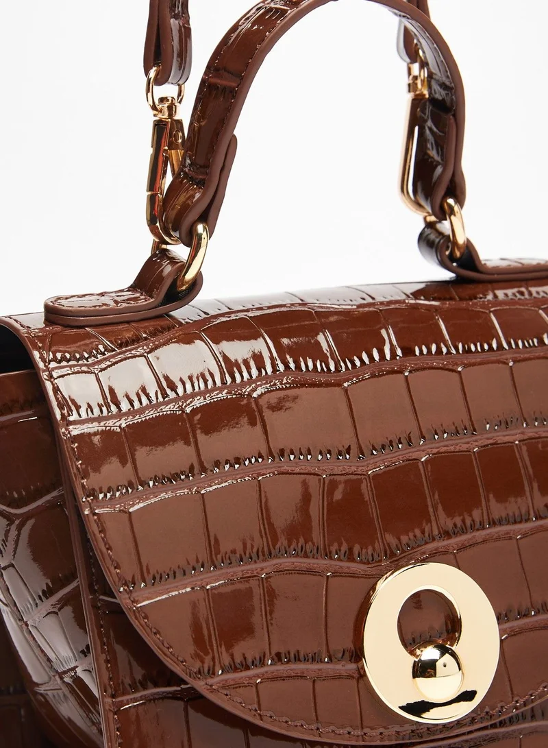 Flora Bella Textured Crossbody Bag with Flap Closure