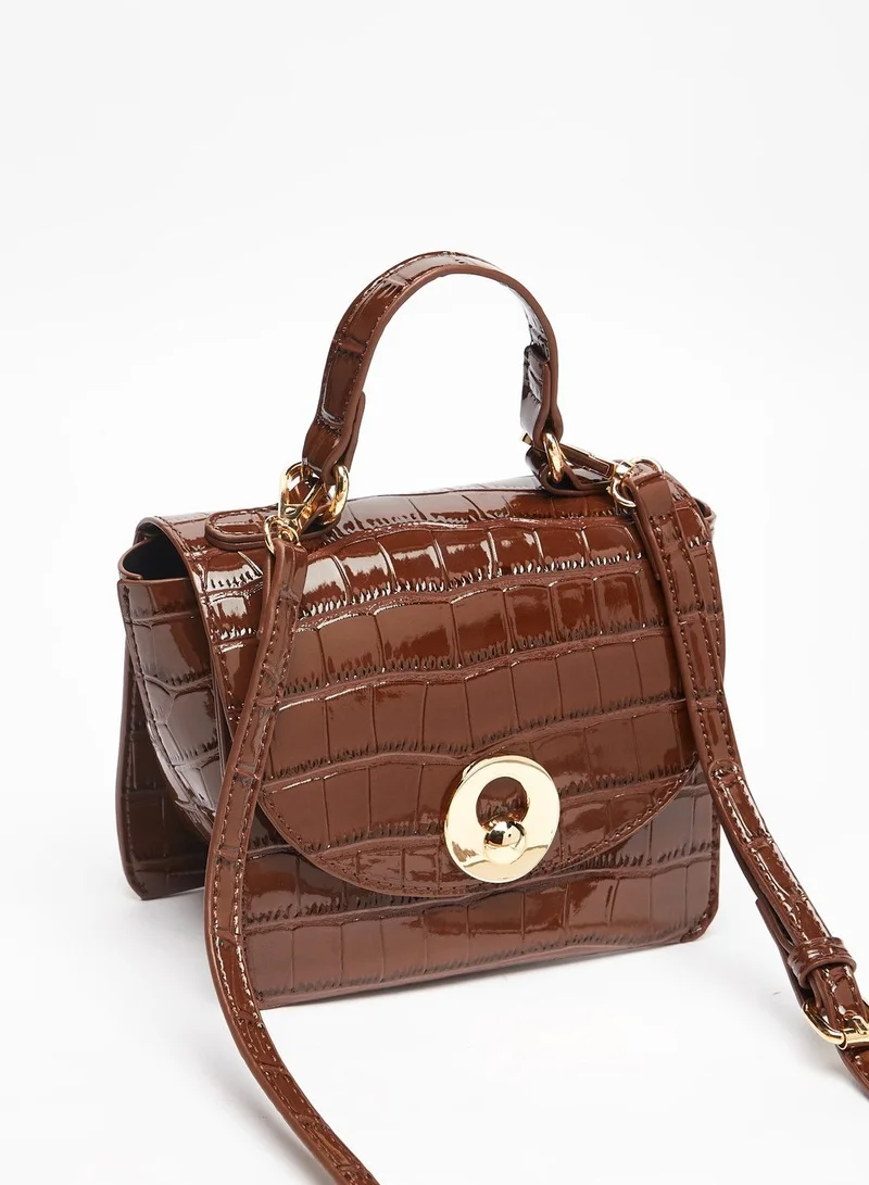 Flora Bella Textured Crossbody Bag with Flap Closure