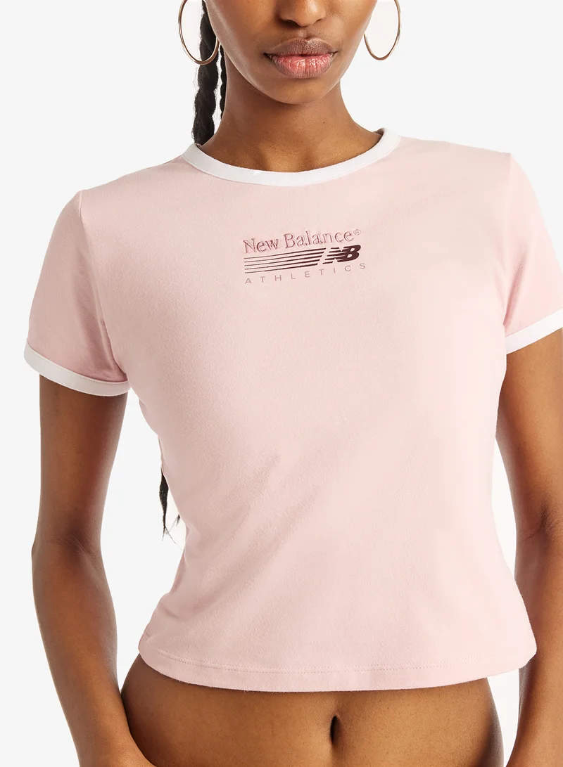 New Balance PINK CHALK (PHK) Trackside Ringer T-Shirt for Women | Best Price UAE