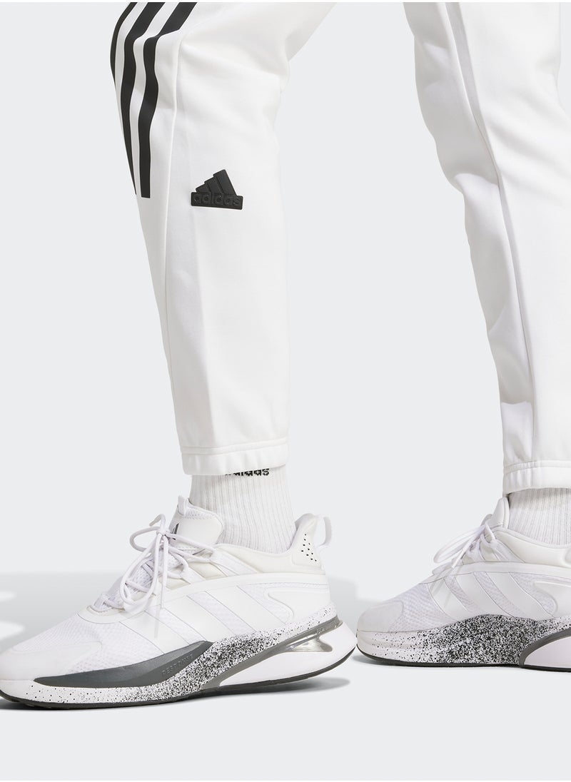Adidas - سروال رياضي ثلاثي الخطوط أيقوني للمستقبل - Image 1