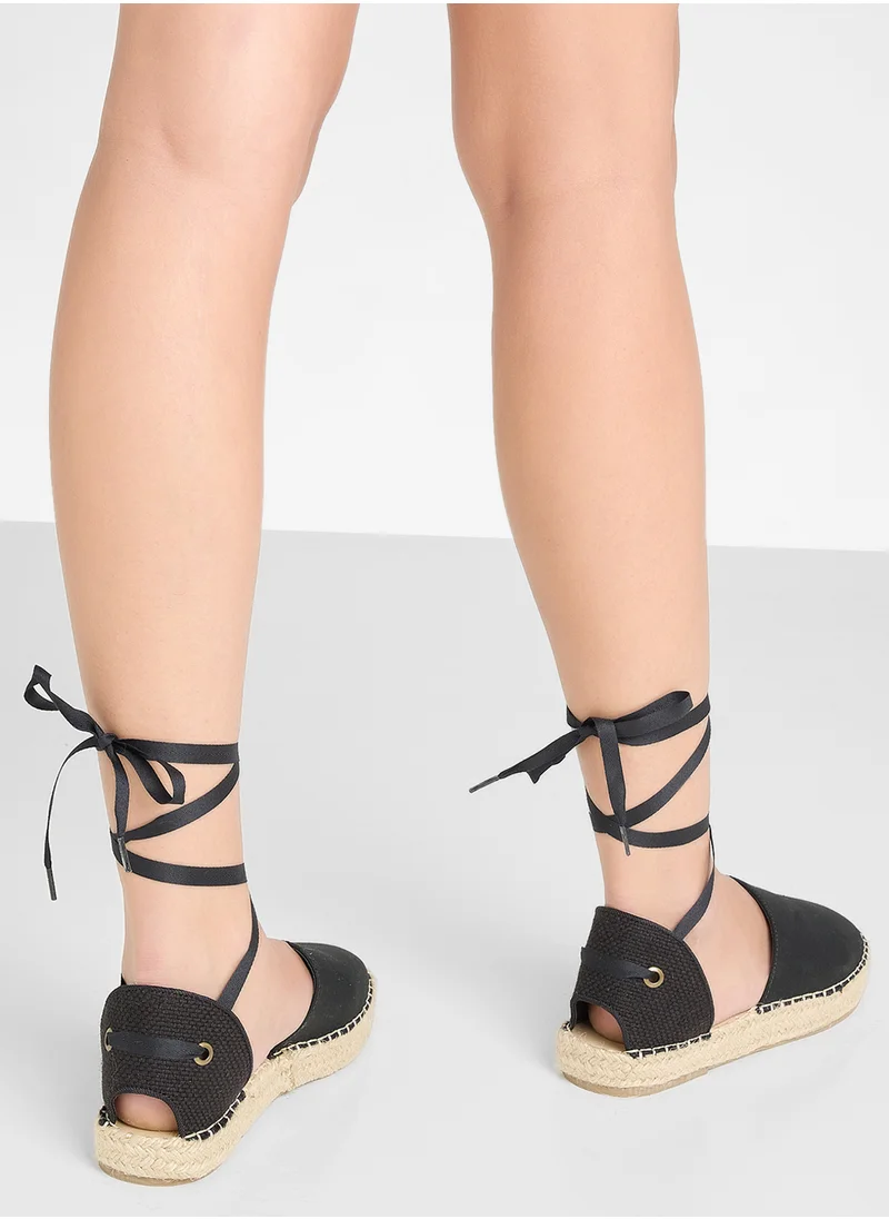 Truffle Espadrille Wrap Around Flat Wedge Sandal