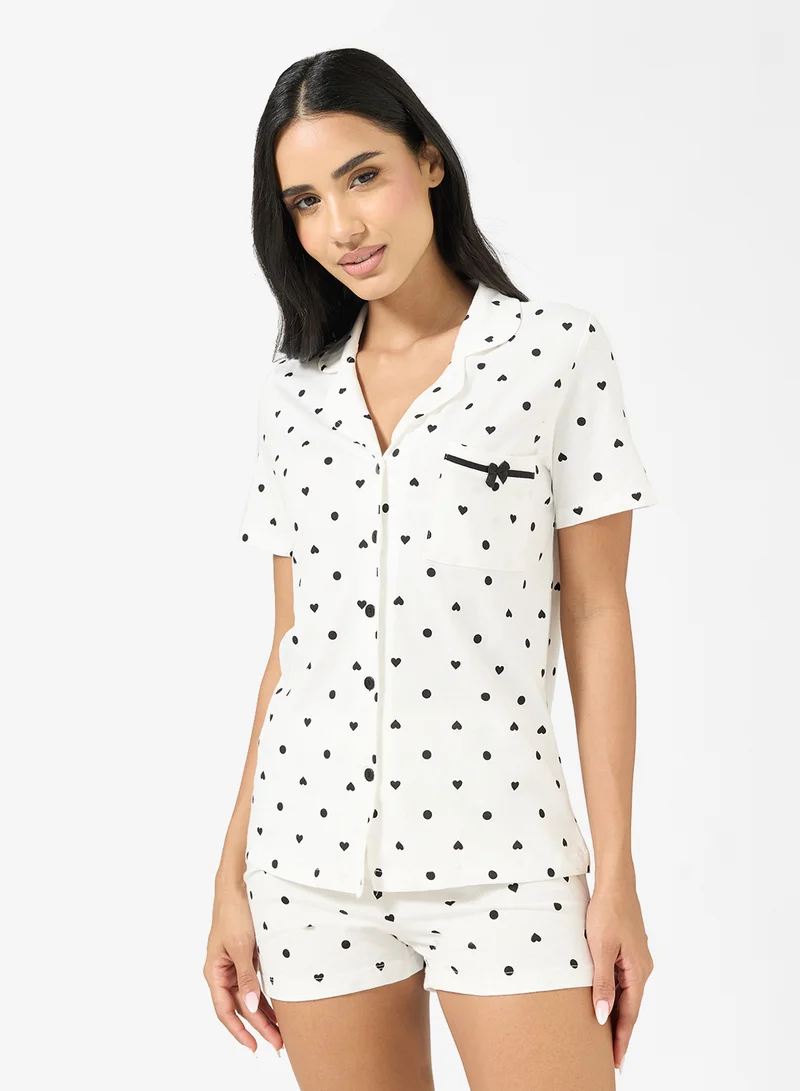 جينجر طقم قميص وشورت منقط بأزرار