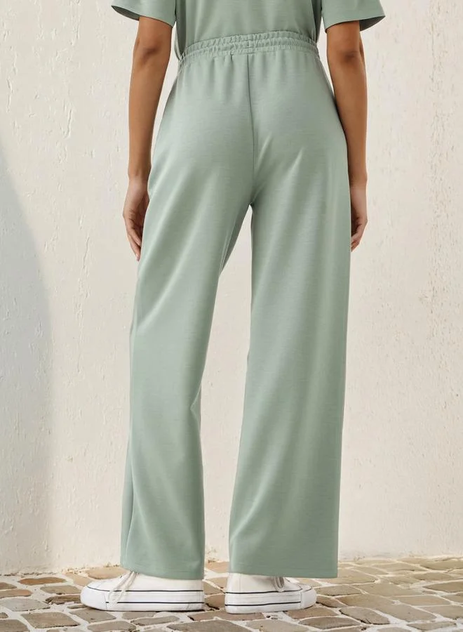 اس بي كاركترز Snoopy Embroidered Wide Leg Pants with Pockets