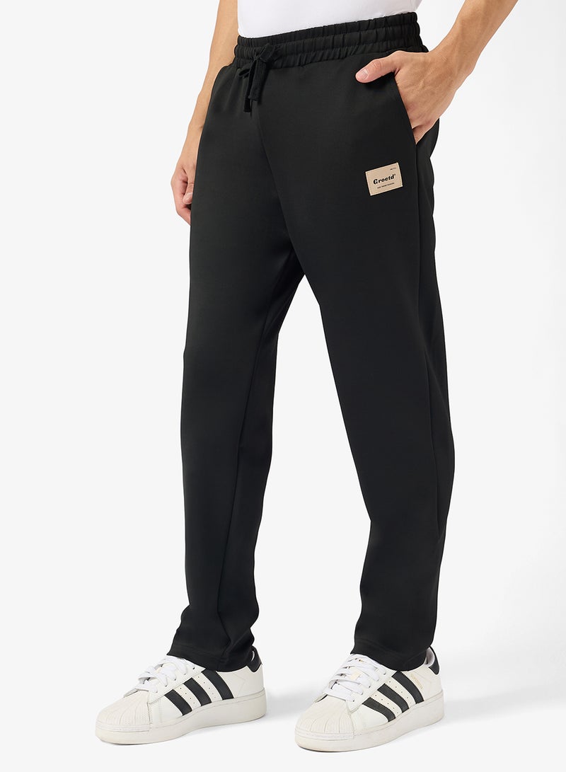 سفنتي فايف بيسيكس بنطلون رياضي مريح بشعار - Image 1