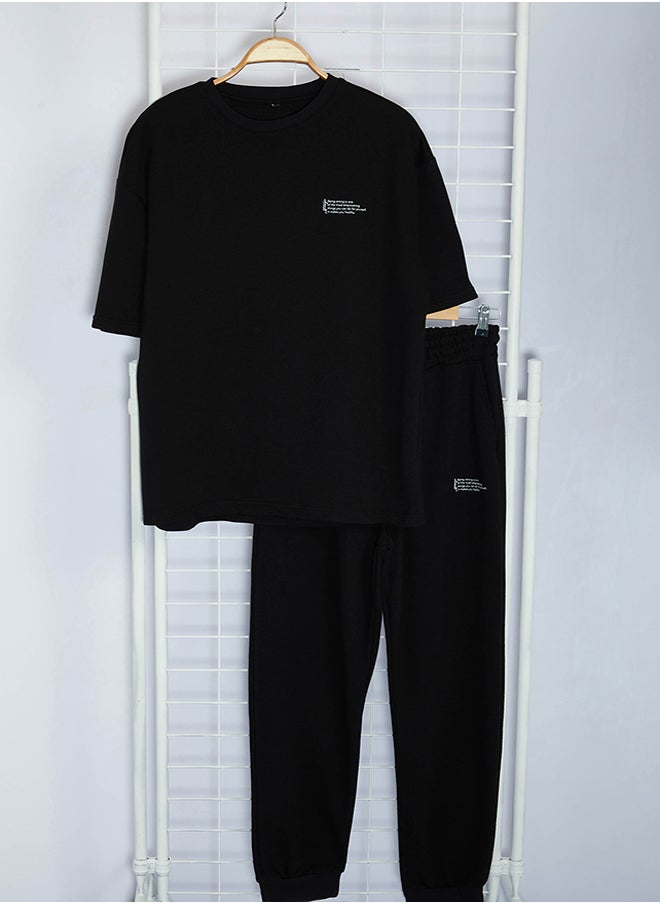 trendyol Black Oversize/Wide Cut Printed T-Shirt Tracksuit Bottom-Top Set TMNSS24EM00007  - Image 1