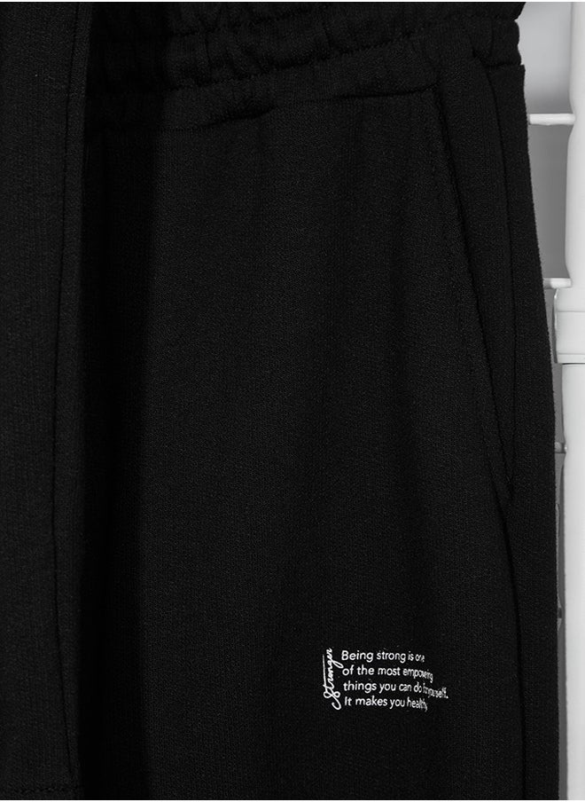 trendyol Black Oversize/Wide Cut Printed T-Shirt Tracksuit Bottom-Top Set TMNSS24EM00007  - Image 2