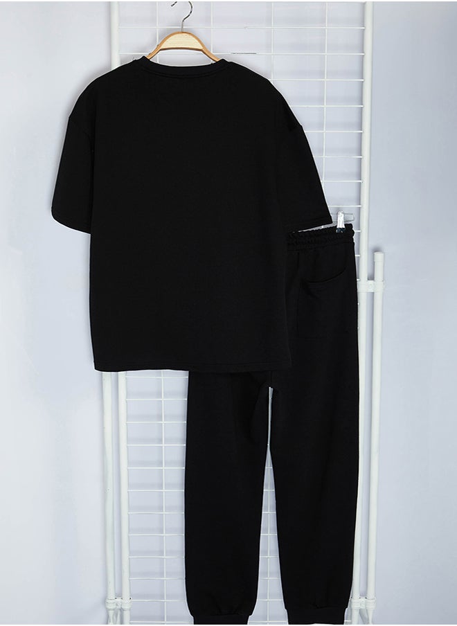 trendyol Black Oversize/Wide Cut Printed T-Shirt Tracksuit Bottom-Top Set TMNSS24EM00007  - Image 3