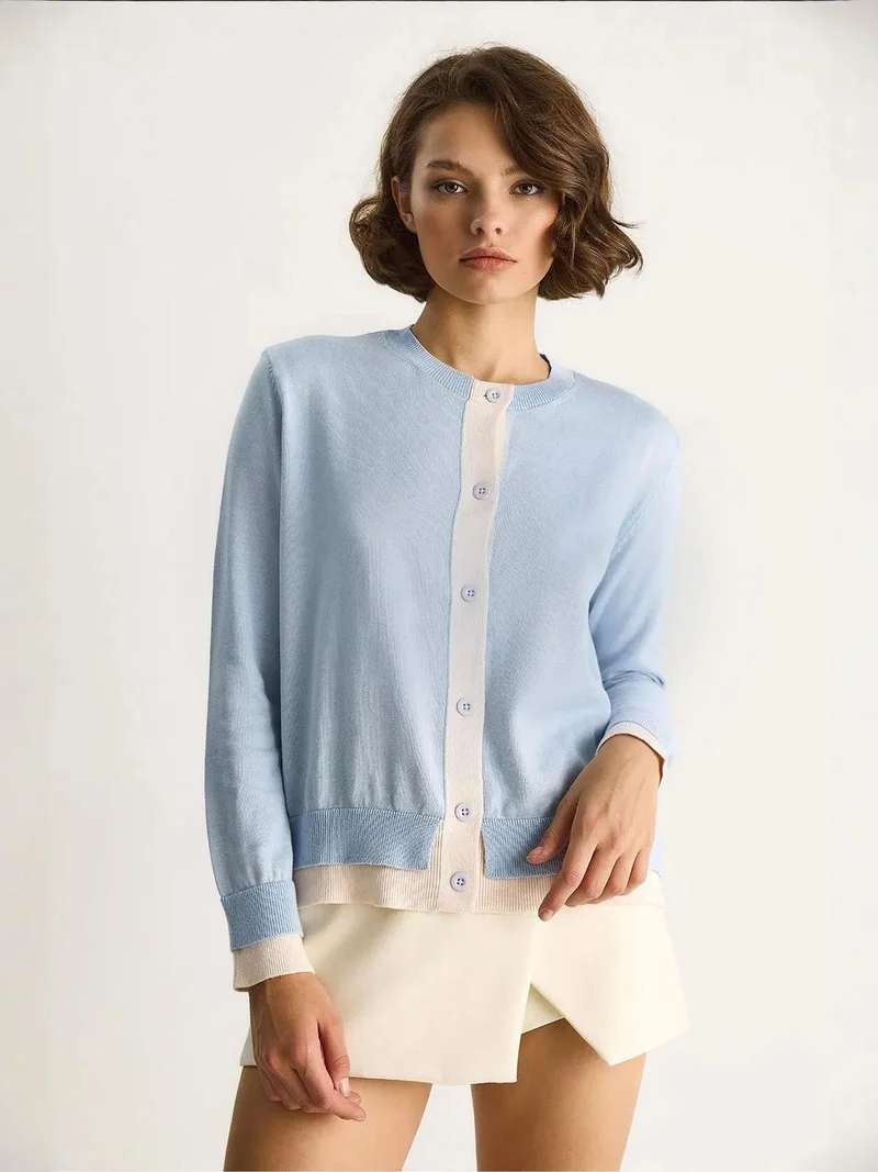 بيانكو لوتشي كارديجان بأزرار وأكمام طويلة بلونين من لوكسي