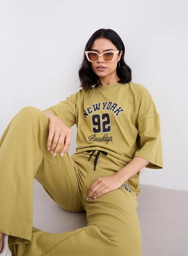 Styli Khaki Oversized Graphic T-Shirt and Joggers Co-Ords