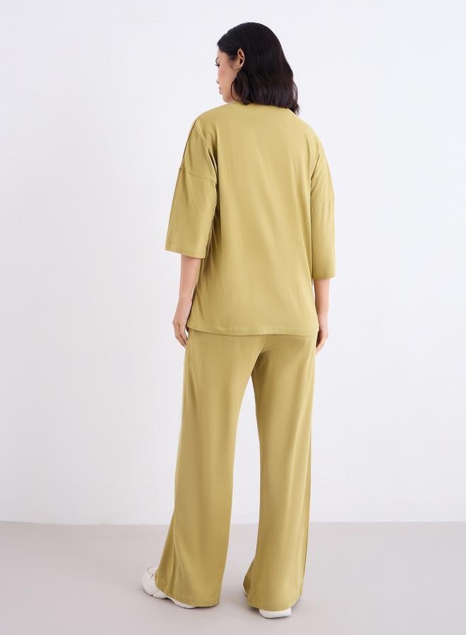 ستايلي طقم منسق من بنطال جوغر وتيشيرت فضفاض - Image 5