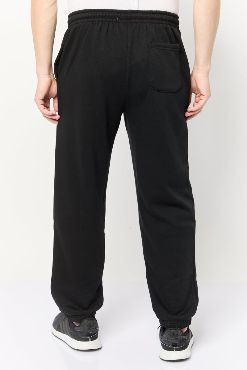 Algspar Men Regular Fit Brand Logo Jogger Pants, Black  - Image 4