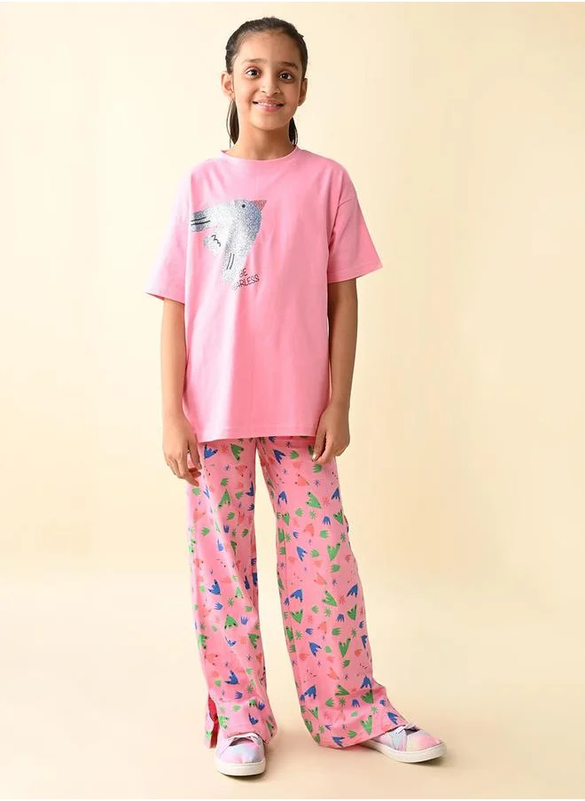 ليلك Graphic Print Oversized T-Shirt and Palazzos Pants Set