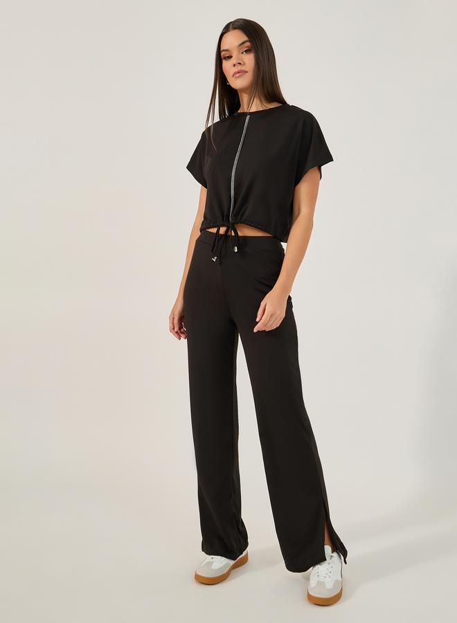 ستايلي طقم بلوزة قصيرة وبنطلون واسع الساق - Image 1