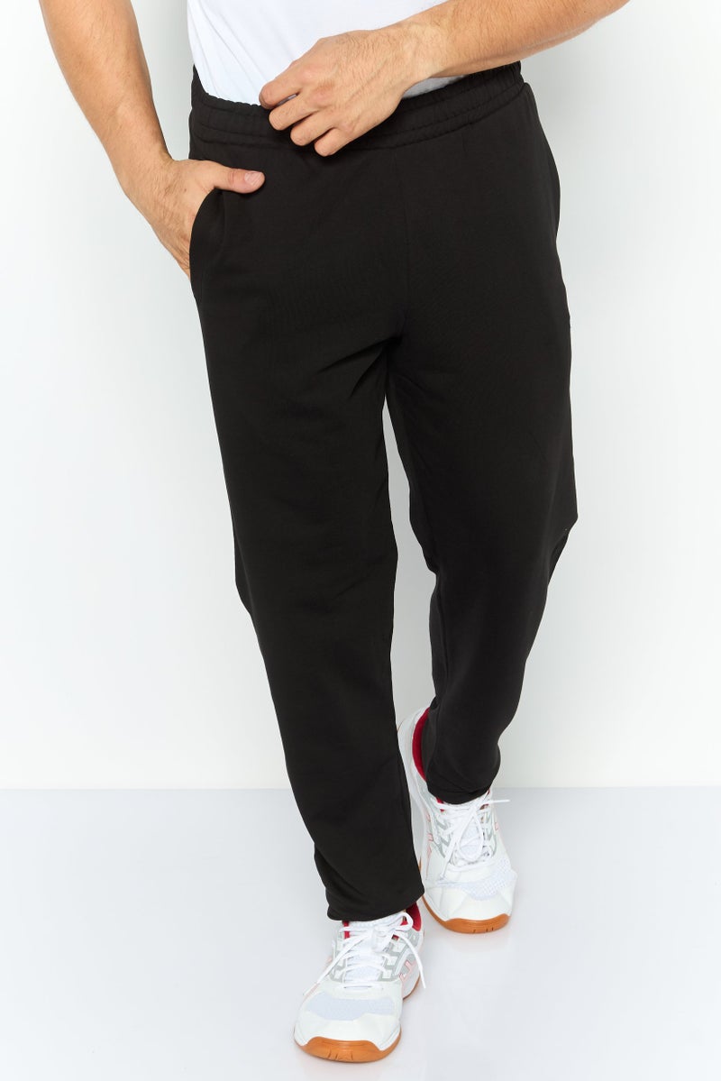 PUMA Men Sportswear Fit Outdoor Jogger Pants, Black - Image 1