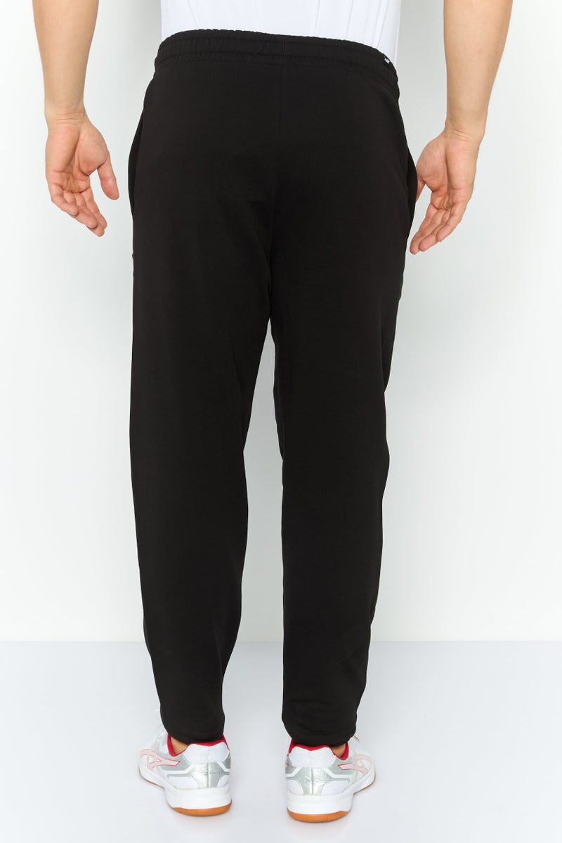 PUMA Men Sportswear Fit Outdoor Jogger Pants, Black - Image 4