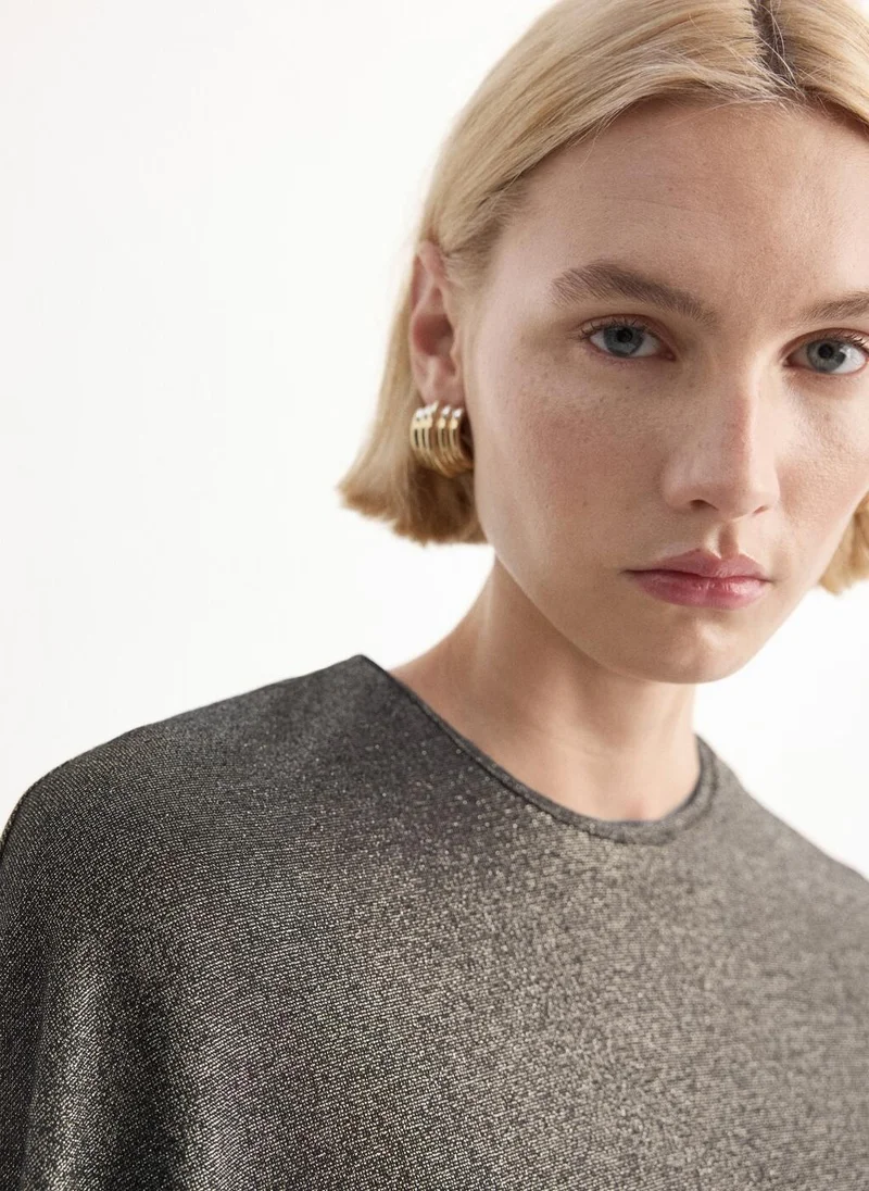 MANGO  Asymmetric lúrex cape for Women | Best Price UAE