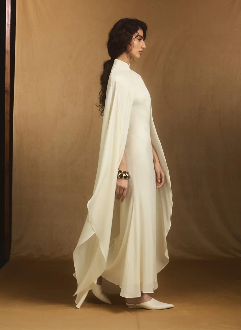 Lichi  Metallic fabric maxi dress with long cape for Women | Best Price UAE