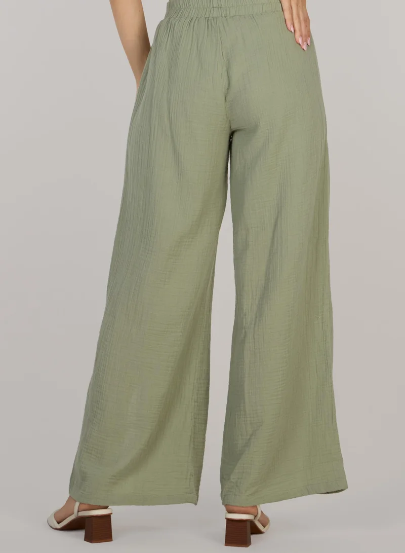 Just Nature Light Olive Green Side Slit Flared Trousers for Women | Best Price UAE