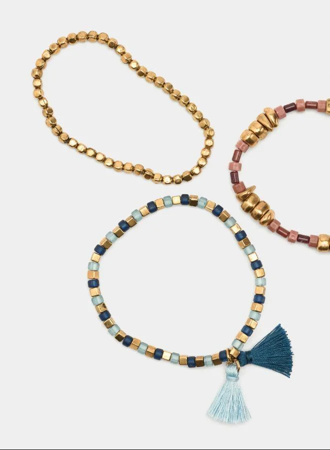 بارفوا مجموعة أساور مطاطية مع أحجار وشرابات متعددة الألوان