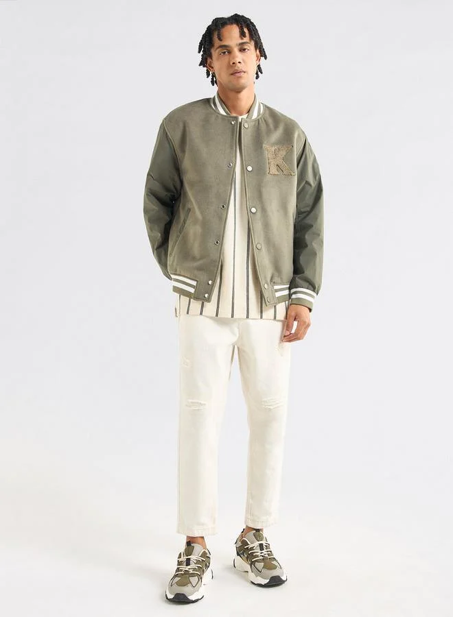 سبلاش فيڤ جاكيت فارسيتي بجيوب وزر إغلاق وتفاصيل زخارف من جونيورز