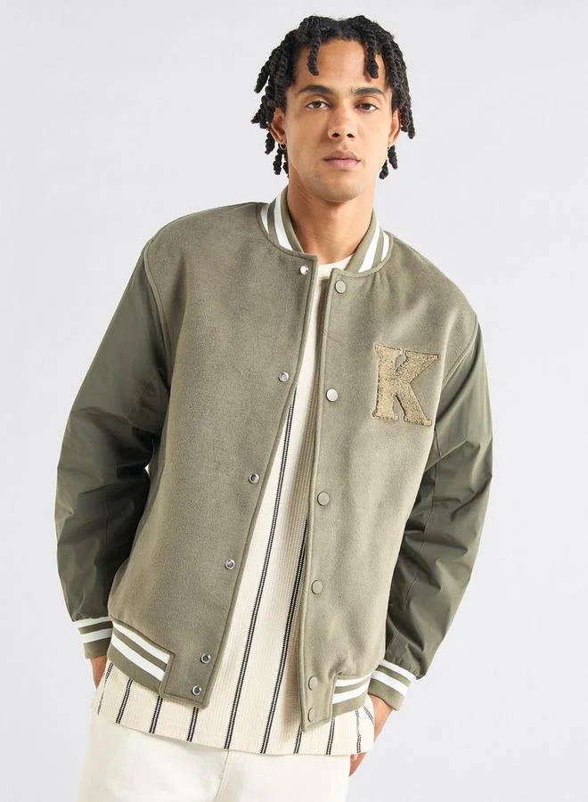 سبلاش فيڤ جاكيت فارسيتي بجيوب وزر إغلاق وتفاصيل زخارف من جونيورز