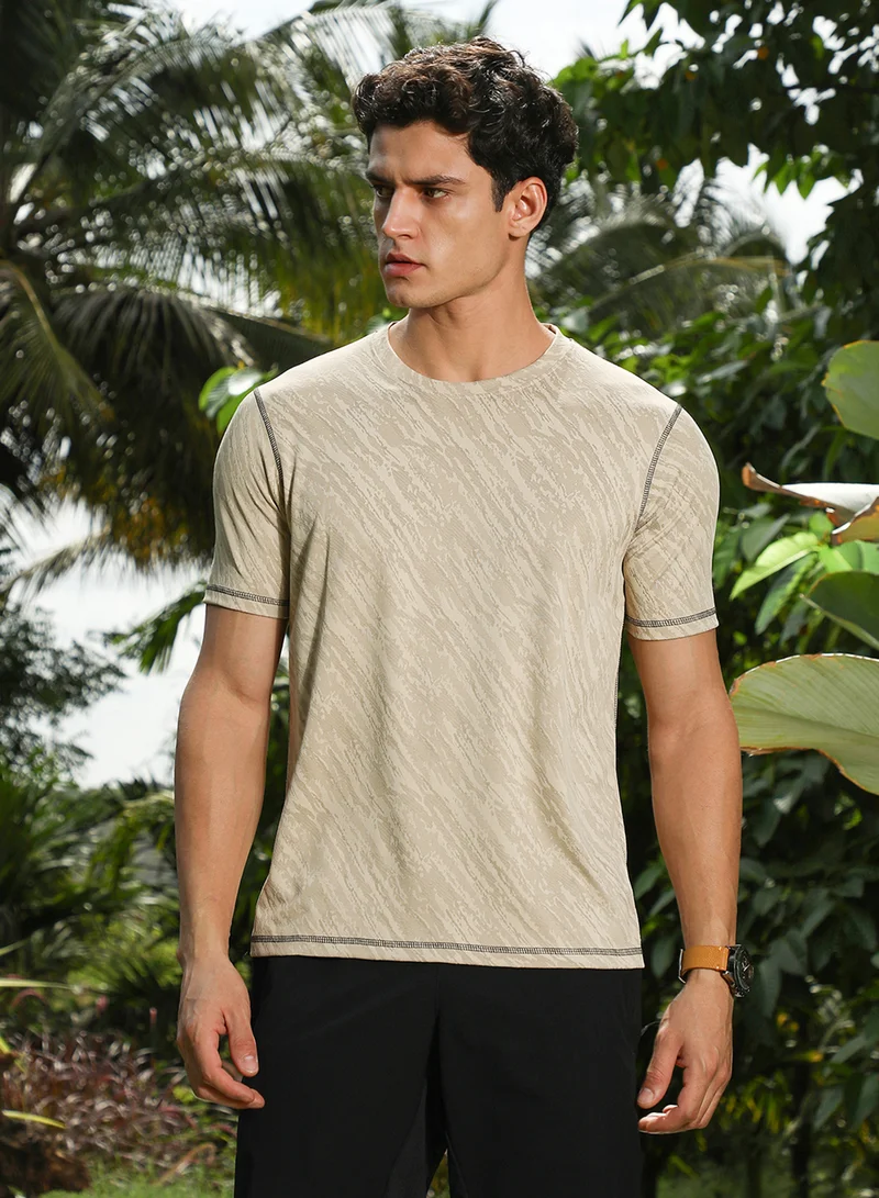 Campus Sutra Campus Sutra Men's Sand Beige Plash-Imprint Activewear T-Shirt For Casual Wear | Round Neck | Short Regular Sleeves | Pull On Closure | Jersey T-Shirt Crafted With Comfort Fit For Everyday Wear